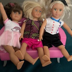 2 American girl mini dolls and 1 our generation